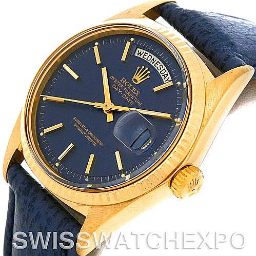 This image shows the face, bezel, and crown of a Rolex President 1803 Men's Yellow Gold Blue Dial 1803 Men's Yellow Gold Blue Dial model watch with a blue dial and gold accents.