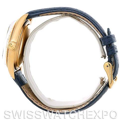 This image shows a side view of a Rolex President 1803 Men's Yellow Gold Blue Dial 1803 Men's Yellow Gold Blue Dial model watch with a leather strap and gold case.