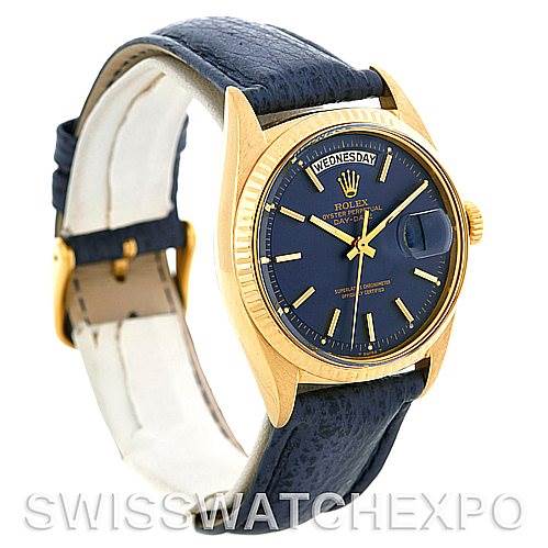 This image shows a Rolex President 1803 Men's Yellow Gold Blue Dial 1803 Men's Yellow Gold Blue Dial model watch from an angled side view, highlighting its blue dial, gold bezel, and leather strap.