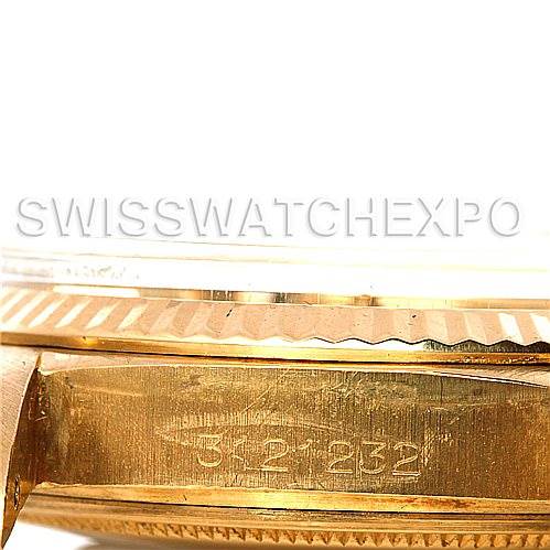 The image shows a close-up of the side of a Rolex President 1803 Men's Yellow Gold Champagne Dial 1803 Men's Yellow Gold Champagne Dial model watch, highlighting its serial number and fluted bezel.