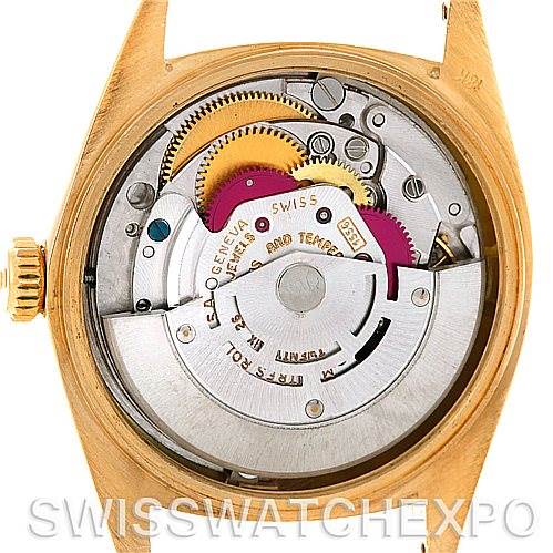 This image shows the back view of a Rolex President 1803 Men's Yellow Gold Champagne Dial 1803 Men's Yellow Gold Champagne Dial model watch, focusing on its intricate internal mechanical parts.