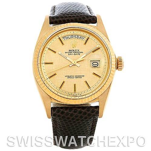 The image shows a front view of a Rolex President 1803 Men's Yellow Gold Champagne Dial 1803 Men's Yellow Gold Champagne Dial model watch, featuring its gold case, day and date display, and leather strap.