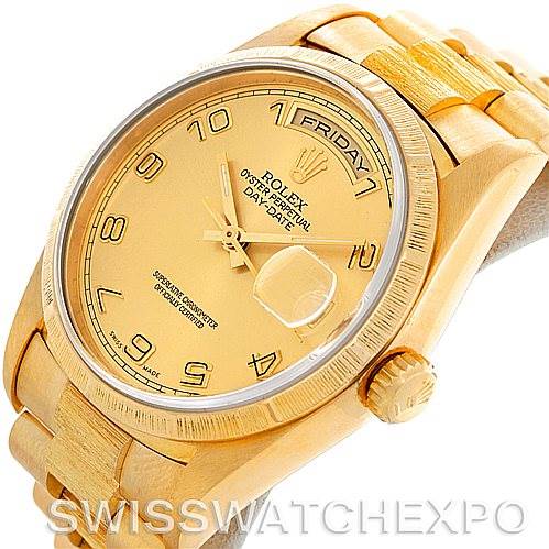 The image shows the dial, bezel, crown, and part of the bracelet of a Rolex President 18248 Men's Yellow Gold Champagne Dial 18248 Men's Yellow Gold Champagne Dial model watch from an angled top-down view.