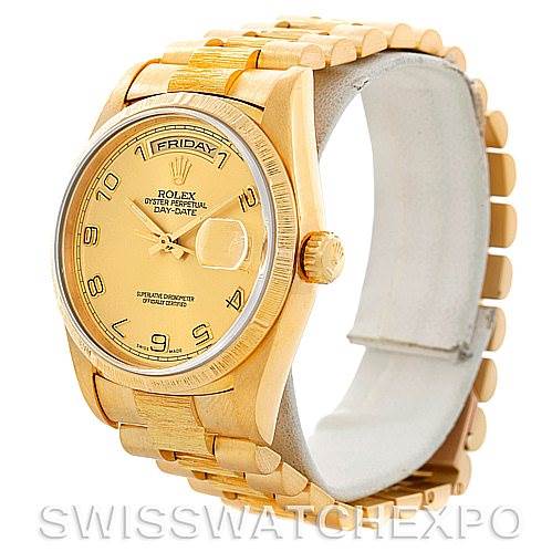 The image shows a Rolex President 18248 Men's Yellow Gold Champagne Dial 18248 Men's Yellow Gold Champagne Dial model watch from an oblique angle, highlighting its face, bezel, crown, and bracelet.