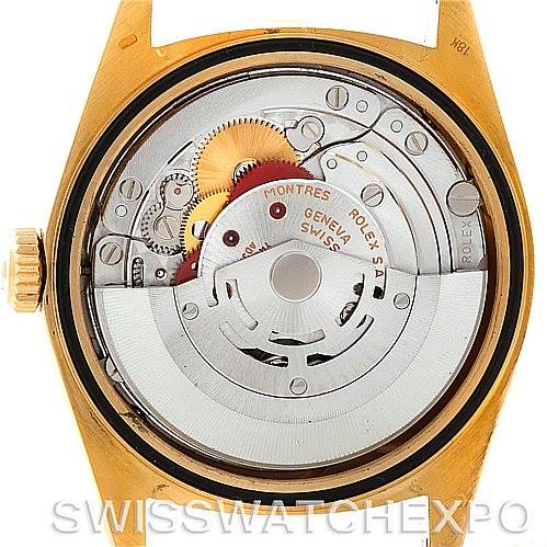 This photo shows the internal mechanics of a Rolex President 18238 Men
s Yellow Gold Champagne Dial 18238 Men
s Yellow Gold Champagne Dial watch, including gears, rotors, and the movement assembly.