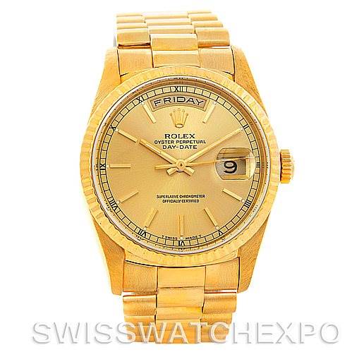 The image shows a Rolex President 18238 Men
s Yellow Gold Champagne Dial 18238 Men
s Yellow Gold Champagne Dial Day-Date watch from the front, highlighting the dial, hands, bracelet, and day-date window.
