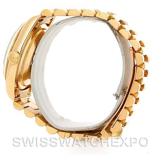 Side view of a Rolex President 18238 Men
s Yellow Gold Champagne Dial 18238 Men
s Yellow Gold Champagne Dial model, showcasing the bracelet links and crown.