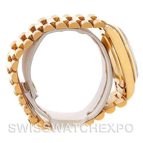 This image shows a side view of a Rolex President 18238 Men
s Yellow Gold Champagne Dial 18238 Men
s Yellow Gold Champagne Dial model watch, highlighting the gold link bracelet and case.