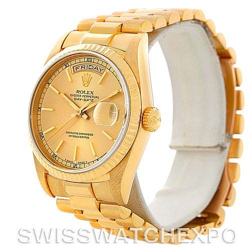 The image shows a side angle of the Rolex President 18238 Men
s Yellow Gold Champagne Dial 18238 Men
s Yellow Gold Champagne Dial model watch, highlighting its gold case, band, and day-date display.