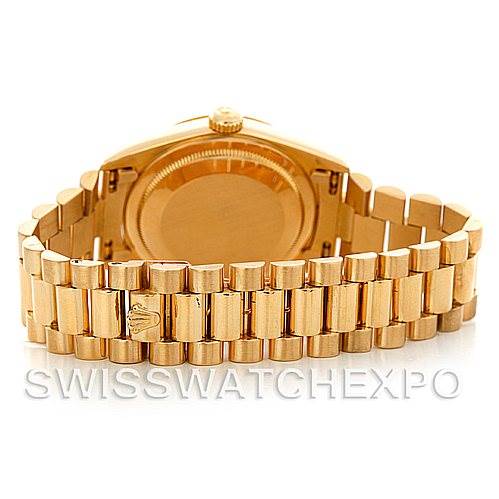 The image shows the back view of the Rolex President 18238 Men
s Yellow Gold Champagne Dial 18238 Men
s Yellow Gold Champagne Dial model watch, focusing on the case back and the bracelet.