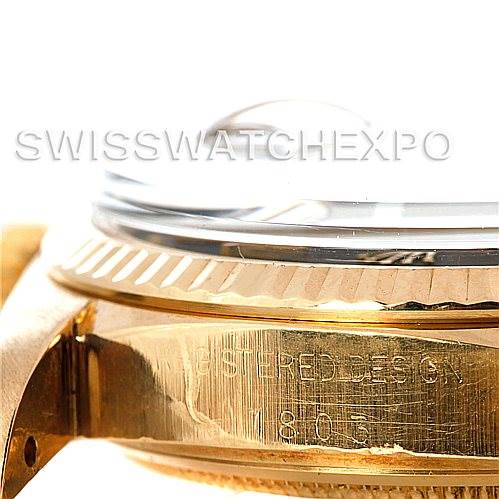 The image shows a close-up side view of the casing and bezel of a Rolex President 1803 Men's Yellow Gold Black Dial 1803 Men's Yellow Gold Black Dial model, highlighting the engraved text “REGISTERED DESIGN 1803.”