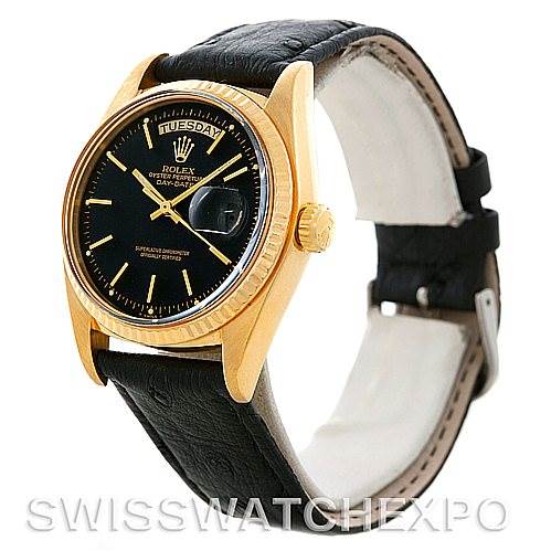 This image shows a side view of a Rolex President 1803 Men's Yellow Gold Black Dial 1803 Men's Yellow Gold Black Dial model watch, highlighting its black dial, gold case, bezel, and black leather strap.