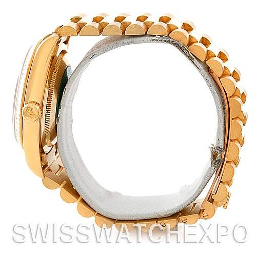 This image shows a side view of the Rolex President 18238 Men
s Yellow Gold Champagne Dial 18238 Men
s Yellow Gold Champagne Dial model, highlighting the watch case and bracelet.