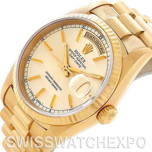 The image shows a close-up of the Rolex President 18238 Men
s Yellow Gold Champagne Dial 18238 Men
s Yellow Gold Champagne Dial model watch, highlighting the dial, bezel, and bracelet from an angled perspective.