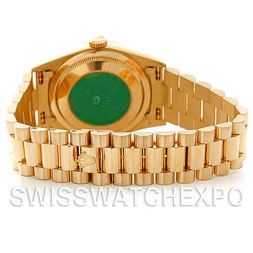 The image shows the backside and bracelet of a Rolex President 18238 Men
s Yellow Gold Champagne Dial 18238 Men
s Yellow Gold Champagne Dial model watch, highlighting the clasp and case back.