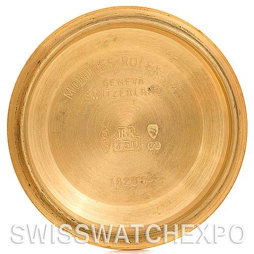 This image shows the inside case back of a Rolex President 18238 Men
s Yellow Gold Champagne Dial 18238 Men
s Yellow Gold Champagne Dial model, highlighting its engravings and gold content marks.