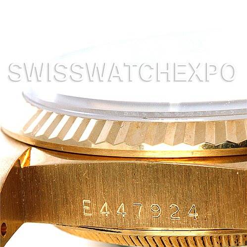 This image shows a close-up side view of a Rolex President 18238 Men
s Yellow Gold Champagne Dial 18238 Men
s Yellow Gold Champagne Dial watch, focusing on the case, bezel, and crystal.
