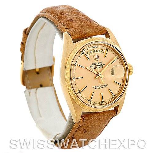 The image shows a Rolex President 1807 Men's Yellow Gold Champagne Dial 1807 Men's Yellow Gold Champagne Dial model watch angled to display the face, bezel, crown, and part of the leather strap.