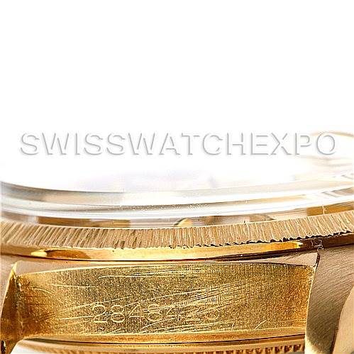This image shows a close-up view of the serial number and edge of the bezel on the Rolex President 1807 Men's Yellow Gold Champagne Dial 1807 Men's Yellow Gold Champagne Dial model watch.