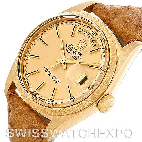 This image shows an angled view of the Rolex President 1807 Men's Yellow Gold Champagne Dial 1807 Men's Yellow Gold Champagne Dial model watch with a focus on the dial, crown, and leather strap.