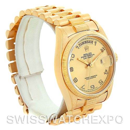 This image shows a side angle view of a Rolex President 18078 Men's Yellow Gold Champagne Dial 18078 Men's Yellow Gold Champagne Dial model watch, highlighting the dial, bezel, and bracelet.