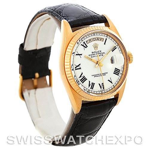 The image shows a Rolex President 1803 Men's Yellow Gold White Dial 1803 Men's Yellow Gold White Dial model watch at a slightly tilted angle, highlighting its face, bezel, crown, and leather strap.