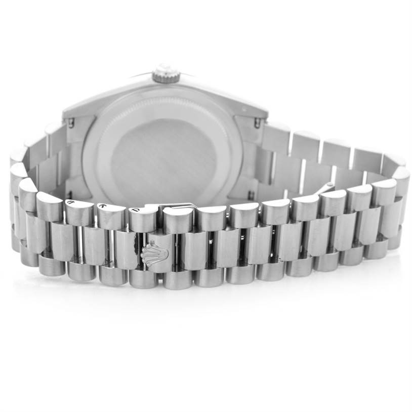 The image shows the back view of a Rolex President 118239 Men's White Gold Black Dial 118239 Men's White Gold Black Dial model watch, highlighting the case back and the bracelet with the Rolex logo.