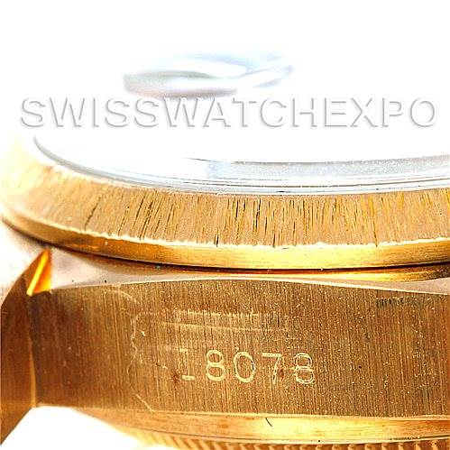 The image shows a close-up of the side of a Rolex President 18078 Men's Yellow Gold Champagne Dial 18078 Men's Yellow Gold Champagne Dial model watch with the serial number visible.