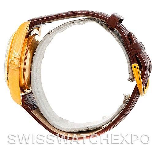 Side view of the Rolex President 18078 Men's Yellow Gold Champagne Dial 18078 Men's Yellow Gold Champagne Dial model watch showcasing the case, crown, and leather strap with a buckle.