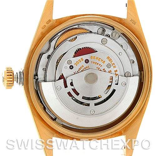The image shows the movement mechanism of a Rolex President 18078 Men's Yellow Gold Champagne Dial 18078 Men's Yellow Gold Champagne Dial model watch from the back, featuring the internal components.