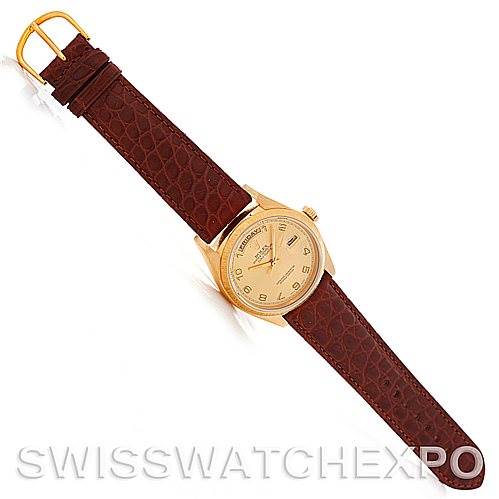 The image shows a Rolex President 18078 Men's Yellow Gold Champagne Dial 18078 Men's Yellow Gold Champagne Dial model watch laid flat, featuring a brown leather strap and a gold-colored dial.