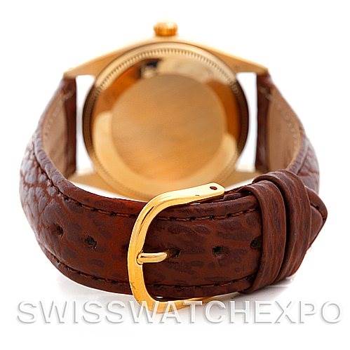 This image shows the back case and strap of a Rolex President 1005 Men's Yellow Gold Silver Dial 1005 Men's Yellow Gold Silver Dial watch from a rear angle.