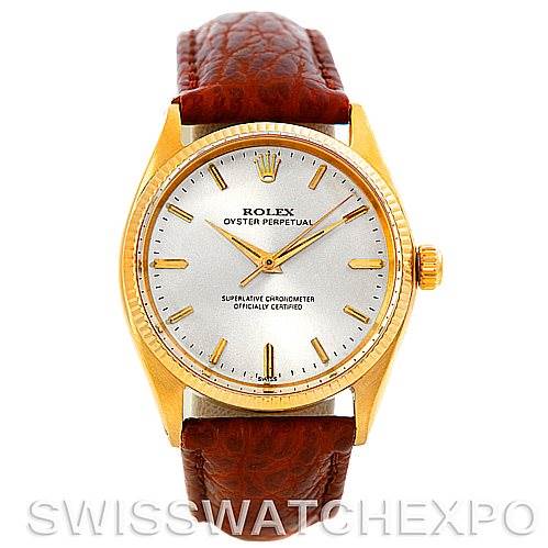 This image shows a front view of the Rolex President 1005 Men's Yellow Gold Silver Dial 1005 Men's Yellow Gold Silver Dial watch, displaying the dial, bezel, crown, and leather strap.