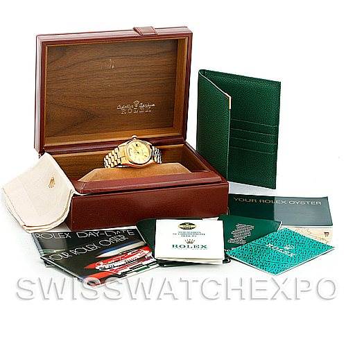 The image shows the Rolex President 18038 Men's Yellow Gold Champagne Dial 18038 Men's Yellow Gold Champagne Dial watch in its box, accompanied by manuals, a pouch, and a green cardholder.