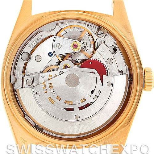 The image shows the back view of a Rolex President 18038 Men's Yellow Gold Champagne Dial 18038 Men's Yellow Gold Champagne Dial model watch, focusing on its internal mechanical movement.