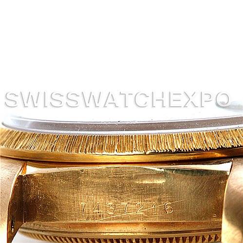 The image shows a close-up angle of the gold Rolex President 18078 Men's Yellow Gold Black Dial 18078 Men's Yellow Gold Black Dial watch focusing on the serial number and part of the bezel.