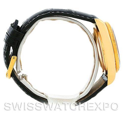 This image shows a side view of the Rolex President 18078 Men's Yellow Gold Black Dial 18078 Men's Yellow Gold Black Dial watch, focusing on the gold case and black leather strap.