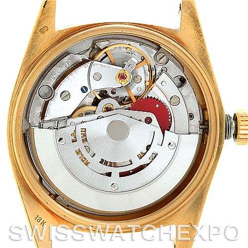 The image shows the inner mechanism and movement parts of a Rolex President 18078 Men's Yellow Gold Black Dial 18078 Men's Yellow Gold Black Dial watch from the back angle.