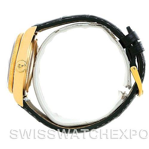 The image shows a side view of a Rolex President 18078 Men's Yellow Gold Black Dial 18078 Men's Yellow Gold Black Dial model, highlighting the gold case, crown, and black leather strap.