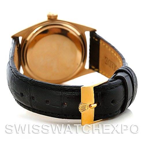 The image shows the Rolex President 1803 Men's Yellow Gold Champagne Dial 1803 Men's Yellow Gold Champagne Dial model from the back, focusing on its black leather strap and gold clasp.