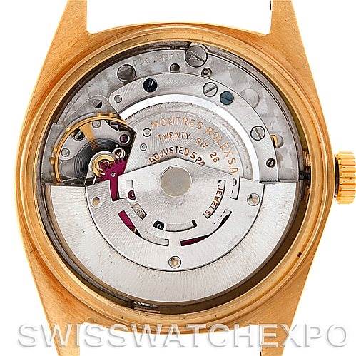 This image shows the internal mechanism and components of a Rolex President 1803 Men's Yellow Gold Champagne Dial 1803 Men's Yellow Gold Champagne Dial model watch from a rear view angle.