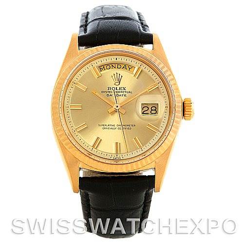 This image shows a front view of a Rolex President 1803 Men's Yellow Gold Champagne Dial 1803 Men's Yellow Gold Champagne Dial model watch, featuring its gold dial, day-date function, and black leather strap.