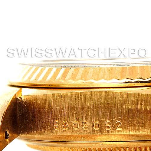 This image shows a close-up side view of the watch case, bezel, and serial number of a Rolex President 18038 Men's Yellow Gold Champagne Dial 18038 Men's Yellow Gold Champagne Dial model.