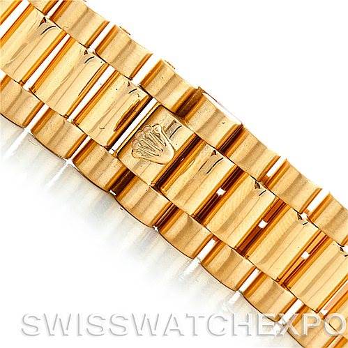 A close-up view of the bracelet of a Rolex President 18038 Men
s Yellow Gold Champagne Dial 18038 Men
s Yellow Gold Champagne Dial model watch, showcasing its gold links.