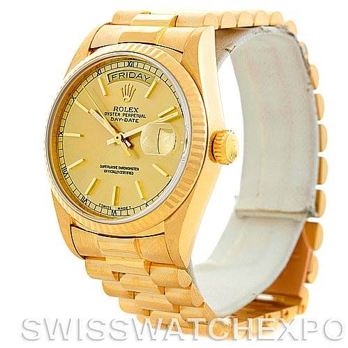 The image shows a side angle view of a gold Rolex President 18038 Men
s Yellow Gold Champagne Dial 18038 Men
s Yellow Gold Champagne Dial model, displaying the face, bezel, crown, and part of the bracelet.