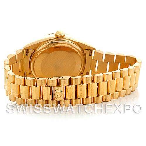 This image shows the back view of a Rolex President 18038 Men
s Yellow Gold Champagne Dial 18038 Men
s Yellow Gold Champagne Dial model watch, highlighting its gold case and President bracelet.