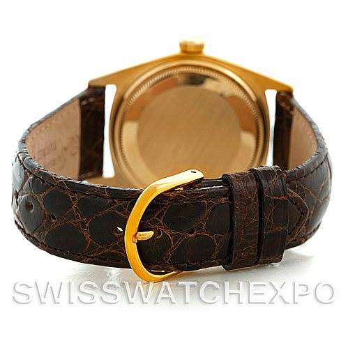 This image shows the back view of a Rolex President 1803 Men's Yellow Gold Silver Dial 1803 Men's Yellow Gold Silver Dial model watch, highlighting its case and leather strap with buckle.