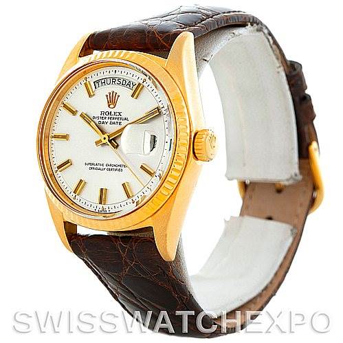 The image shows a Rolex President 1803 Men's Yellow Gold Silver Dial 1803 Men's Yellow Gold Silver Dial model watch at a slight angle displaying its dial, day-date feature, crown, and leather strap.