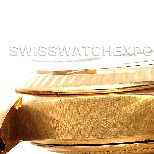 Close-up of a Rolex President 1803 Men
s Yellow Gold Champagne Dial 1803 Men
s Yellow Gold Champagne Dial model showing the side angle with the serial number engraved on the gold casing.