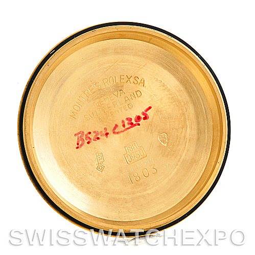 This is the inside case back of a Rolex President 1803 Men
s Yellow Gold Champagne Dial 1803 Men
s Yellow Gold Champagne Dial model watch, featuring inscriptions and markings.